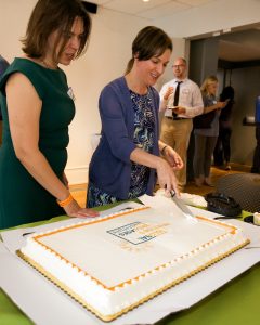cake cutting for first year of the UVA Global Infectious Diseases Institute