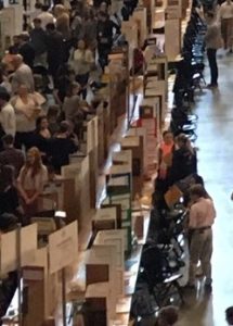 picture of sicence fair - students, poster boards and judges