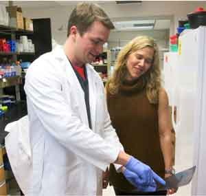 CJ Anderson and Melissa Kendall in lab